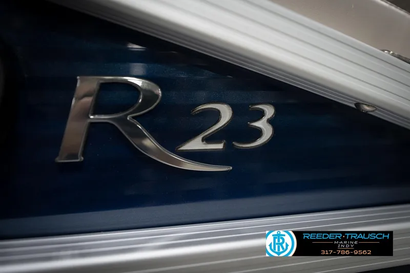 Slide: The Image of Close-up of 2016 Bennington 2375 RSB boat emblem with "R23" lettering. - 58