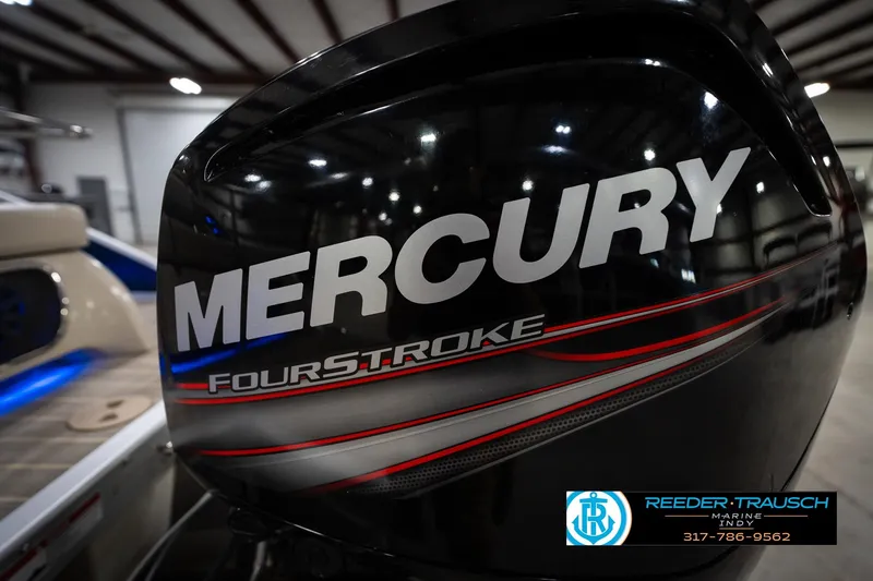 Slide: The Image of Mercury FourStroke engine on 2016 Bennington 2375 RSB boat in showroom. - 61