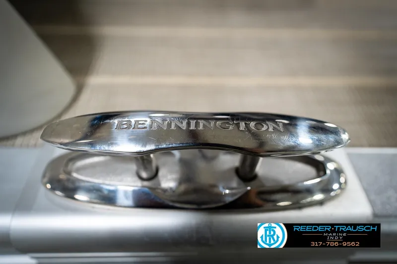 Slide: The Image of 2016 Bennington 2375 RSB boat cleat with engraved logo, Reeder-Trausch Marine branding. - 66