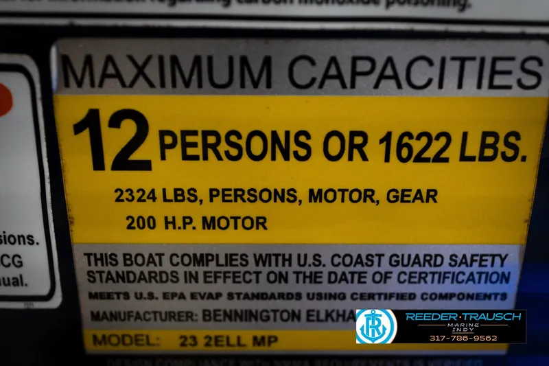 Slide: The Image of 2016 Bennington 2375 RSB capacity label: 12 persons, 1622 lbs, 200 HP motor. - 67