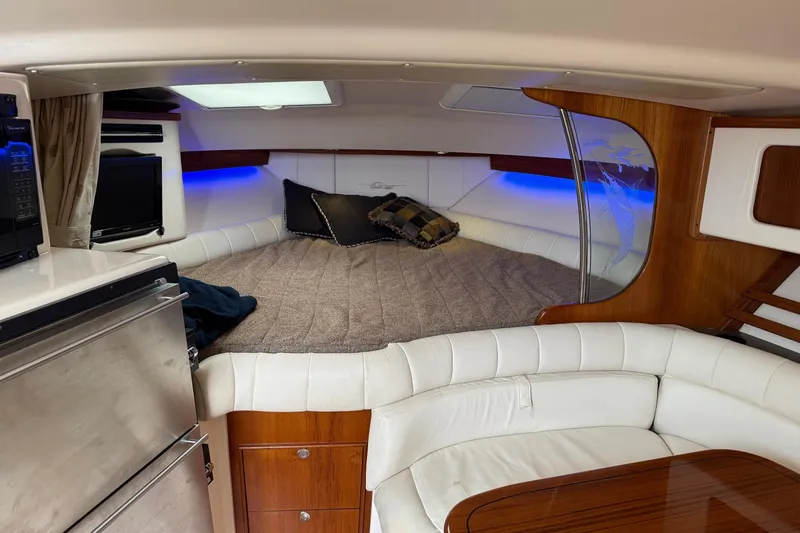 Slide: The Image of Luxurious 2008 Grady-White Express 360 cabin interior with cozy bed and modern amenities. - 11