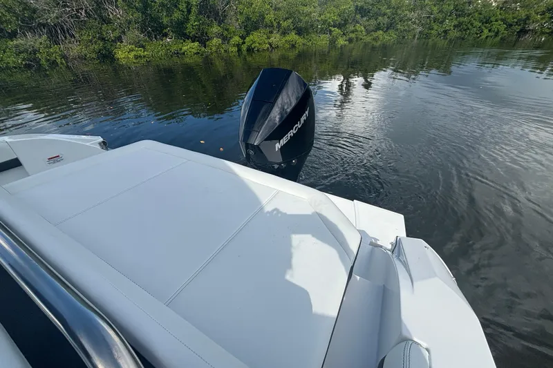 Slide: The Image of 2025 Cobalt R4 Outboard boat with Mercury engine on calm water. - 6