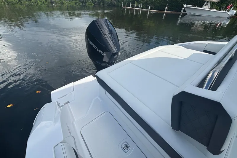 Slide: The Image of 2025 Cobalt R4 Outboard boat with Mercury engine on calm water. - 7