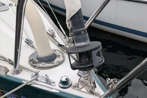 Slide: The Image of Close-up of a 2001 Alerion 28 sailboat deck with Harken winch and rigging. - 3