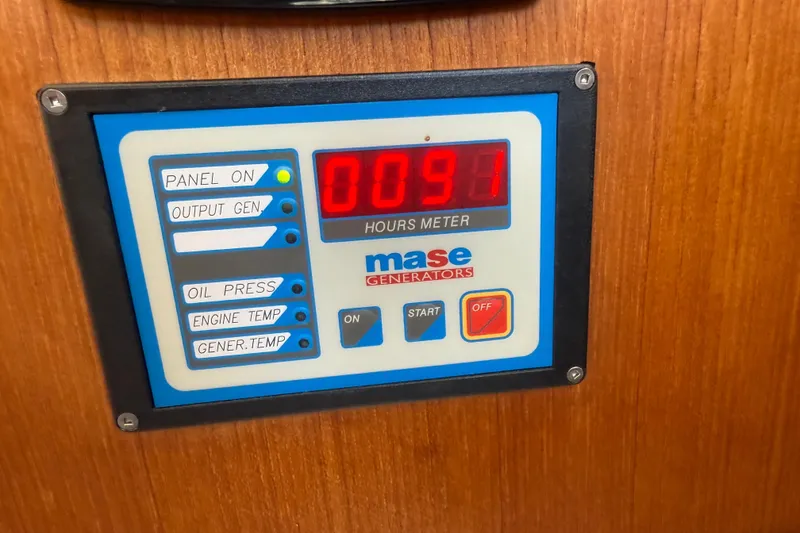 Slide: The Image of Engine compartment of 2013 Ranger Tugs R28 Classic with visible gauge and components. - 28