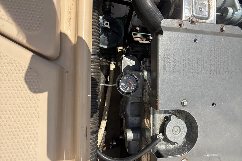 Slide: The Image of Yanmar engine plate on 2013 Ranger Tugs R28 Classic, displaying specifications and compliance details. - 29