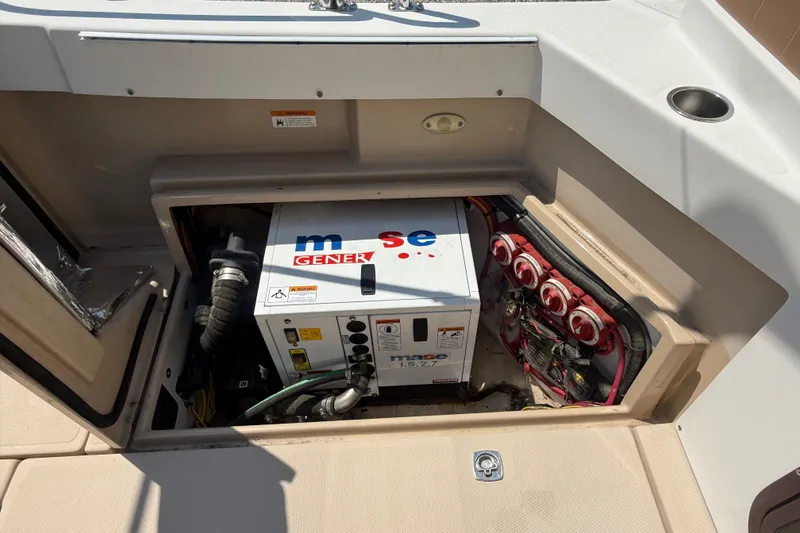 Slide: The Image of Interior of 2013 Ranger Tugs R27 Classic boat bathroom with window and sink. - 7