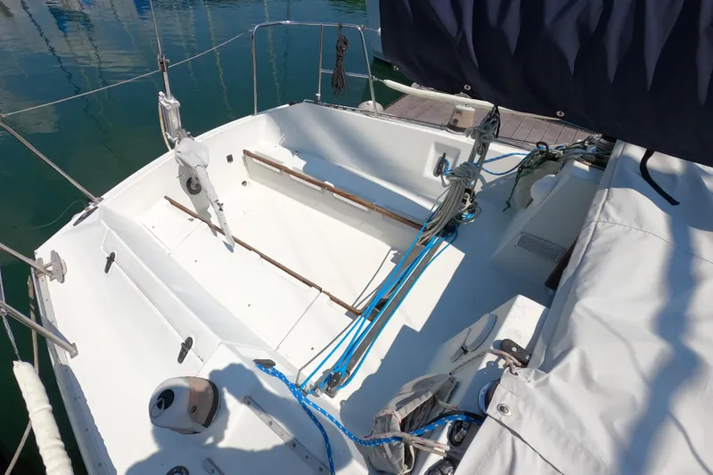 Slide: The Image of Cockpit of 1985 Beneteau First 29 sailboat with rigging and seating. - 8