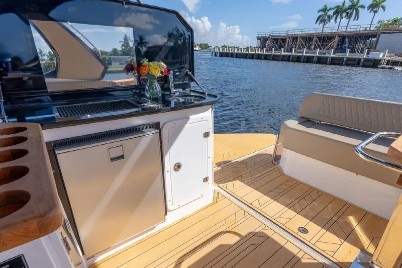 Slide: The Image of Luxurious 2024 Hanover 347 yacht interior with elegant seating and waterfront view. - 9