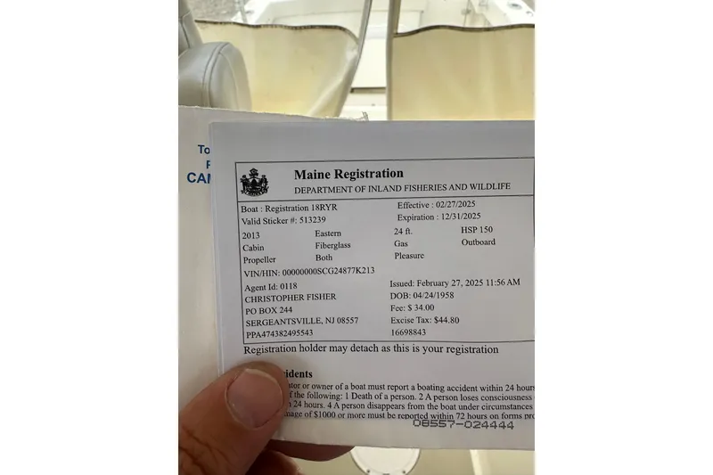 Slide: The Image of Maine boat registration document for 2013 Eastern Explorer 248, effective 2025. - 19