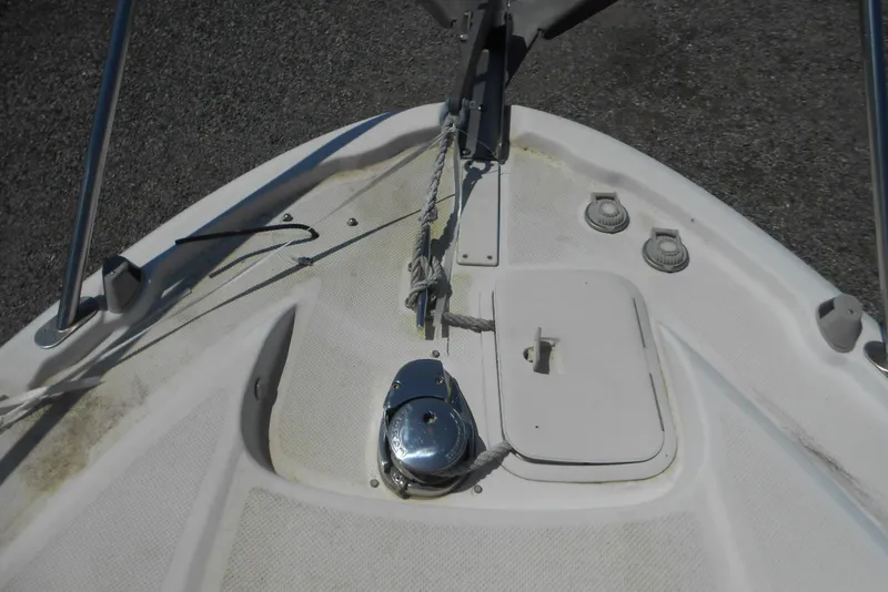 Slide: The Image of Bow of 2008 Bayliner 300 boat with anchor and deck fittings. - 11