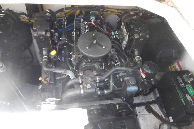 Slide: The Image of Engine compartment of a 2008 Bayliner 300 boat, showing detailed mechanical components. - 20