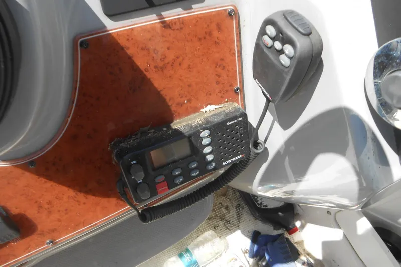 Slide: The Image of Control panel of a 2008 Bayliner 300 boat with radio equipment. - 5