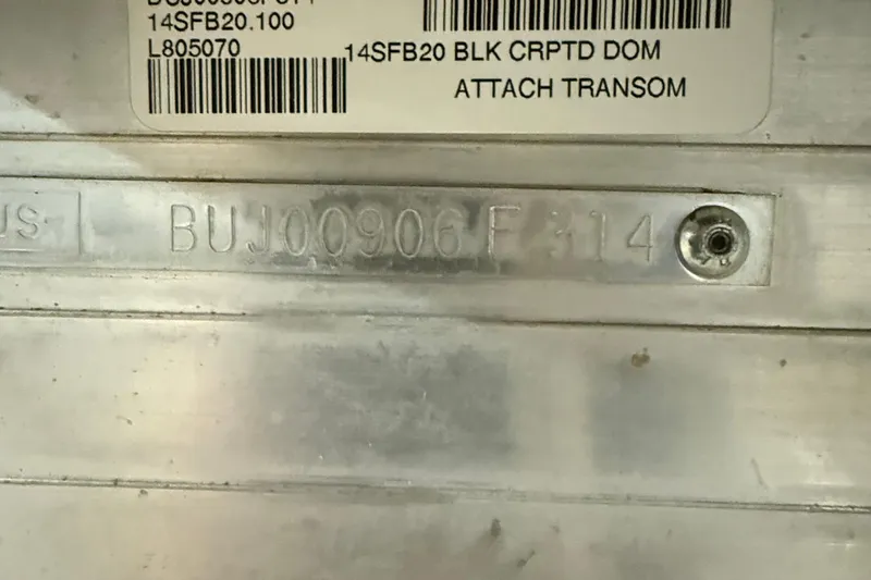 Slide: The Image of 2014 Sun Tracker Fishin' Barge 20 DLX hull identification number and barcode. - 6