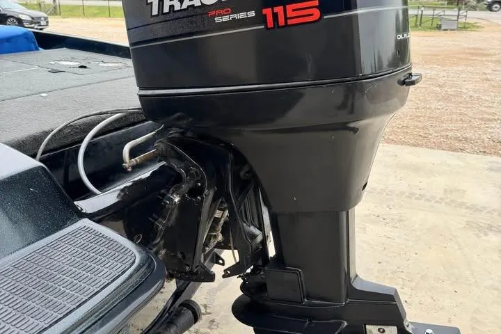 Slide: The Image of Outboard motor on a 1994 Nitro 170 DC boat, Tracker Pro Series 115. - 11