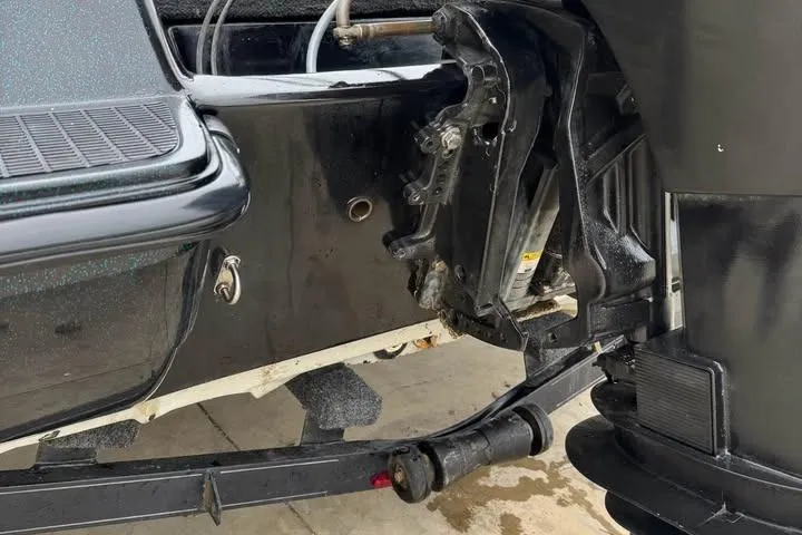 Slide: The Image of Close-up of a 1994 Nitro 170 DC boat's motor mount and transom area. - 15