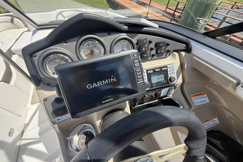 Slide: The Image of 2014 Yamaha Boats 242 Limited S dashboard with Garmin navigation system. - 15