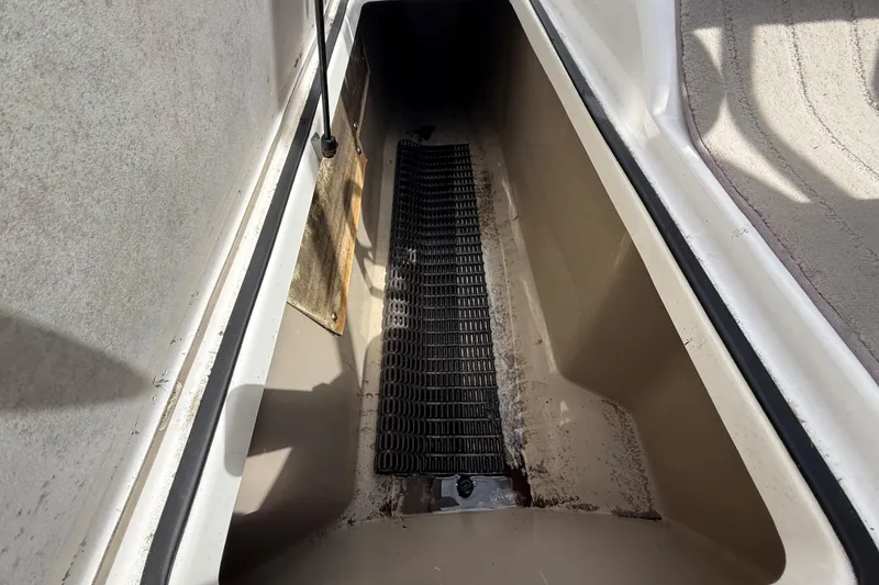 Slide: The Image of Storage compartment of 2014 Yamaha Boats 242 Limited S, featuring a non-slip mat. - 21