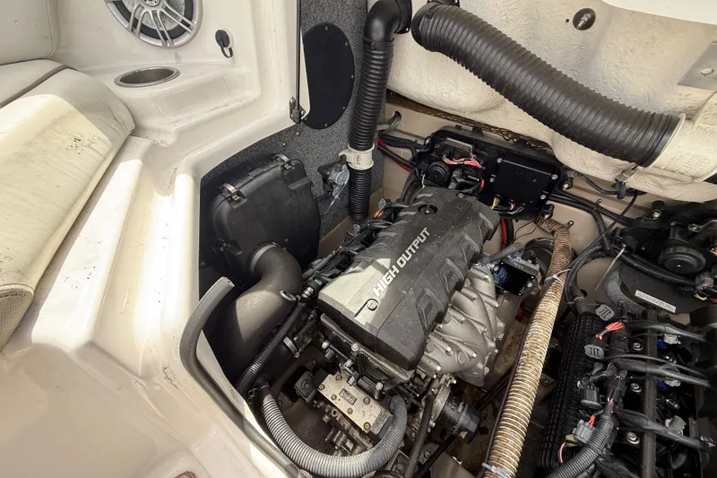 Slide: The Image of Engine compartment of 2014 Yamaha Boats 242 Limited S, showcasing high output engine components. - 51