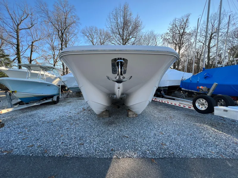 Slide: The Image of 2025 Invincible 33 Catamaran front view in boatyard. - 1