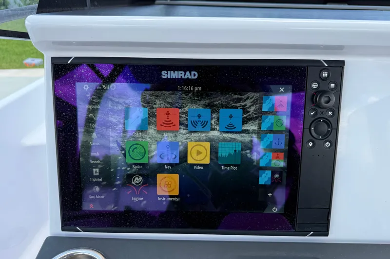 Slide: The Image of Simrad navigation display on 2023 Axopar 25 Cross Top boat dashboard. - 38