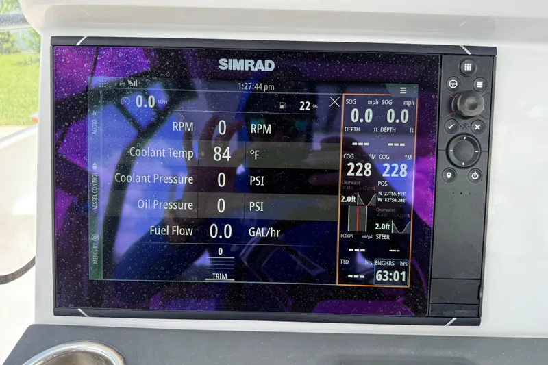 Slide: The Image of Simrad display on 2023 Axopar 25 Cross Top showing engine and navigation data. - 40