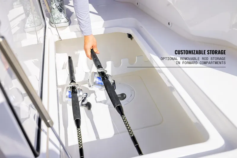 Slide: The Image of Customizable storage on 2025 Invincible 36 Catamaran with removable rod storage. - 18