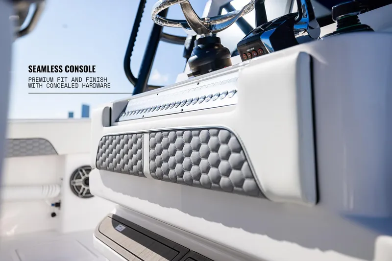 Slide: The Image of 2025 Invincible 36 Catamaran console with premium fit, finish, and concealed hardware. - 22