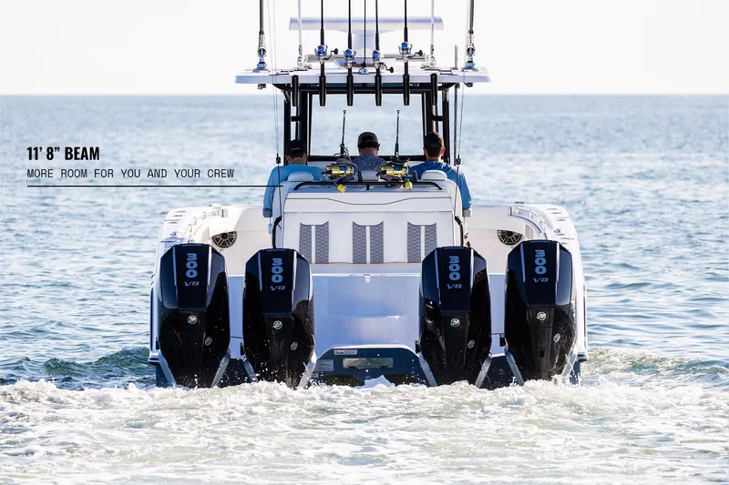 Slide: The Image of 2025 Invincible 36 Catamaran with quad engines, 11'8" beam, cruising on open water. - 4