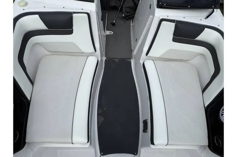Slide: The Image of 2016 Yamaha AR240 boat interior with white and black seating arrangement. - 14