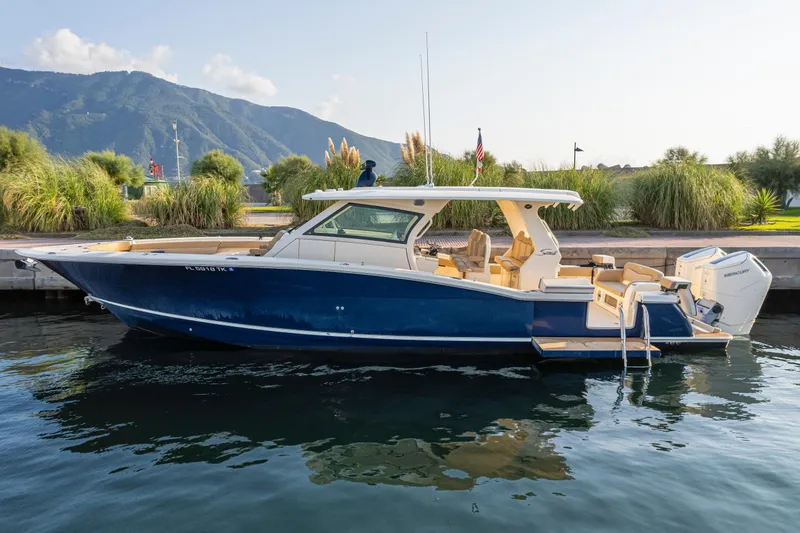 Slide: The Image of Luxurious interior of 2023 Scout 425 LXF boat with modern amenities and sleek design. - 34