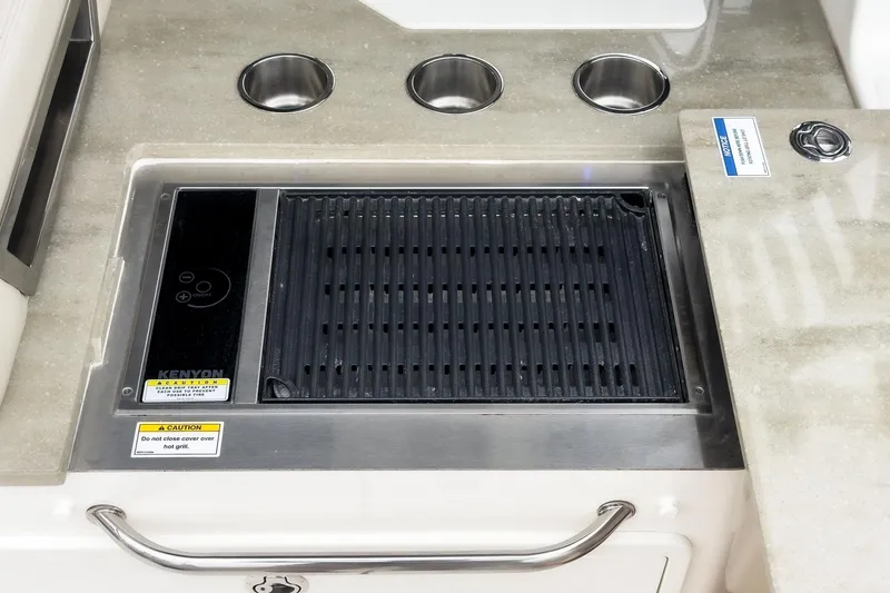 Slide: The Image of Built-in grill on 2022 Boston Whaler 350 Realm boat. - 33