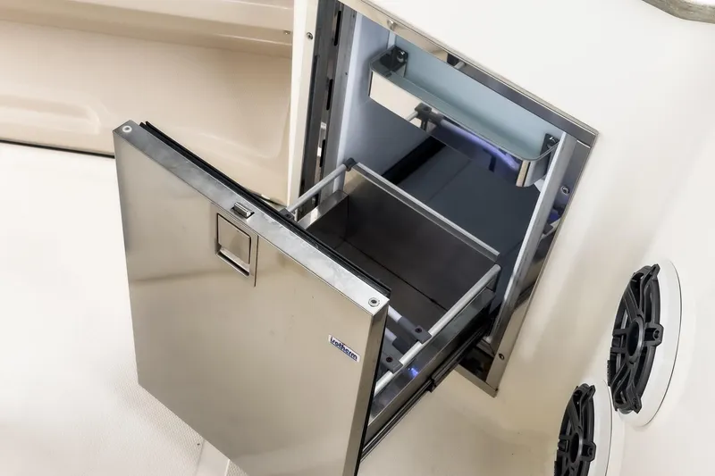Slide: The Image of Stainless steel drawer on 2022 Boston Whaler 350 Realm boat, open with visible interior. - 35