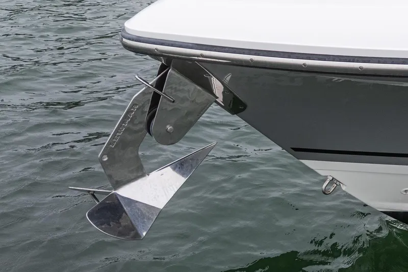 Slide: The Image of Boston Whaler 350 Realm 2022 boat anchor detail over water. - 78
