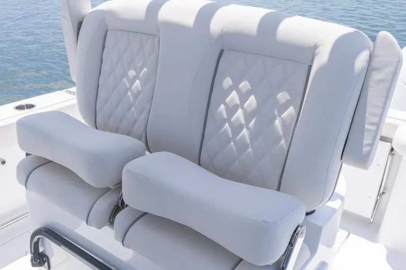 Slide: The Image of Luxury seating on 2026 Sea Hunt Gamefish 25 boat, featuring diamond-stitched upholstery. - 14