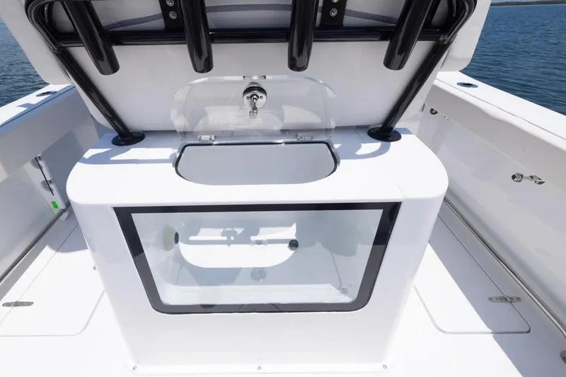 Slide: The Image of 2026 Sea Hunt Gamefish 25 boat interior with livewell and seating. - 16