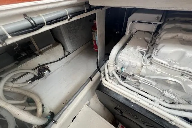 Slide: The Image of Engine compartment of a 2007 Northern Bay Hardtop Cruiser/Fishing Vessel, showing mechanical components. - 25