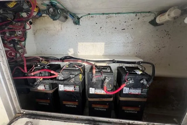 Slide: The Image of Battery compartment of a 2007 Northern Bay Hardtop Cruiser/Fishing Vessel with multiple batteries. - 30