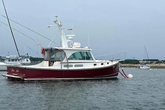 Slide: The Image of 2007 Northern Bay Hardtop Cruiser/Fishing Vessel anchored in calm waters. - 34