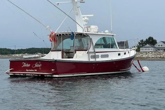 Slide: The Image of 2007 Northern Bay Hardtop Cruiser/Fishing Vessel on calm water near shoreline. - 35