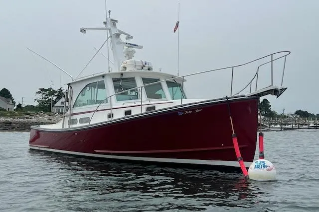 Slide: The Image of 2007 Northern Bay Hardtop Cruiser/Fishing Vessel on calm water near shoreline. - 36