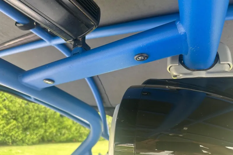 Slide: The Image of Close-up of blue frame and speaker on 2018 Yamaha 242 X boat. - 27