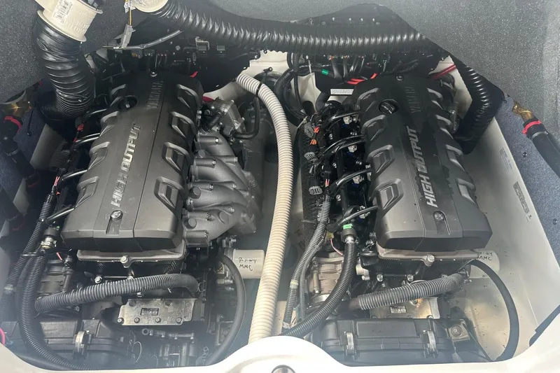 Slide: The Image of 2018 Yamaha 242 X high output engines in boat engine compartment. - 28