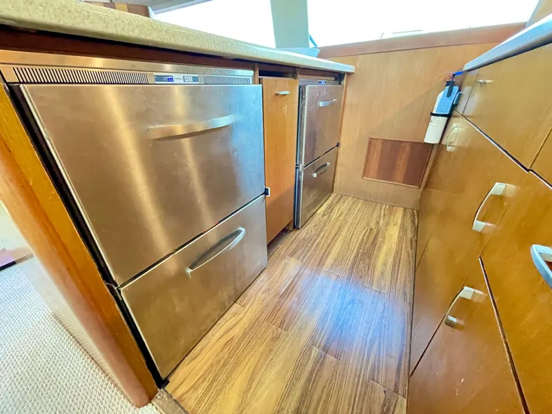 Slide: The Image of Modern kitchen in 2000 Ocean Yachts 43 Super Sport with stainless steel appliances. - 37