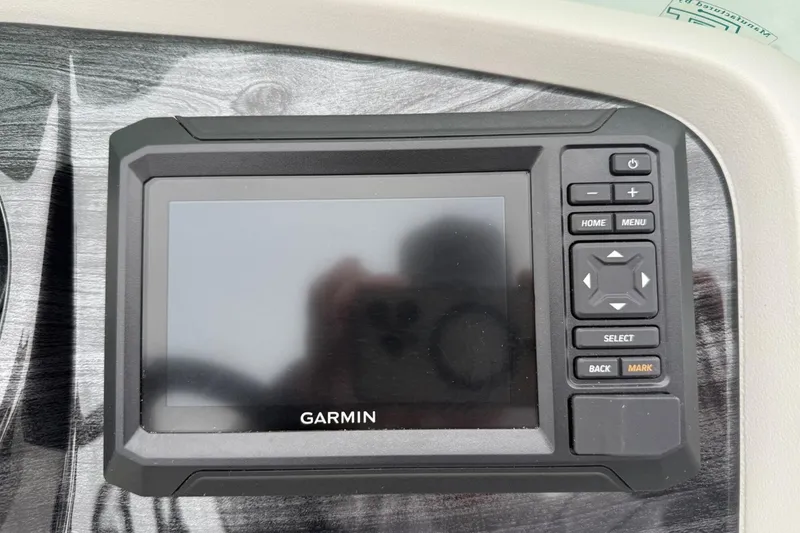 Slide: The Image of Garmin display on 2025 Tahoe 2185 dashboard with control buttons. - 15