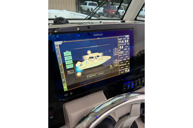 Slide: The Image of Simrad display on 2023 Boston Whaler 280 Dauntless boat dashboard. - 22