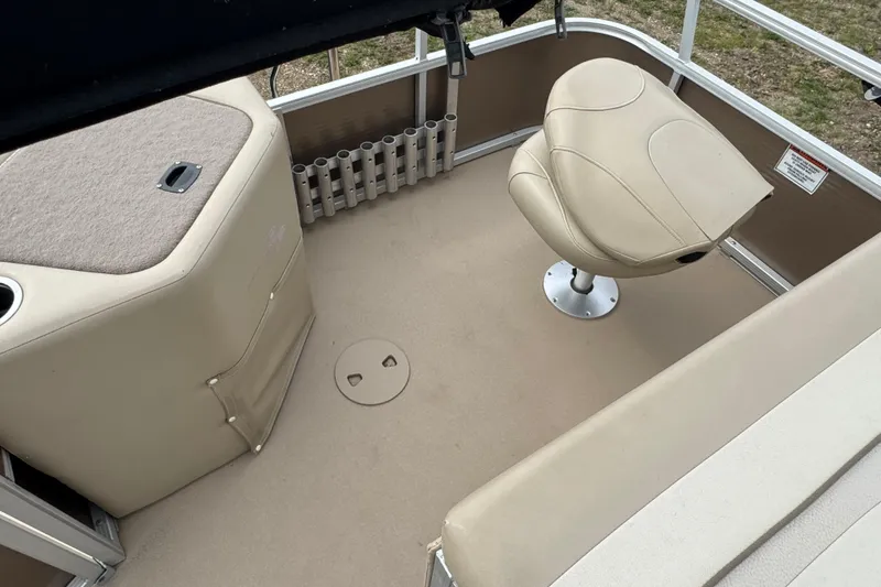 Slide: The Image of Steering console of 2012 Bennington 24 SF boat with gauges and controls. - 14