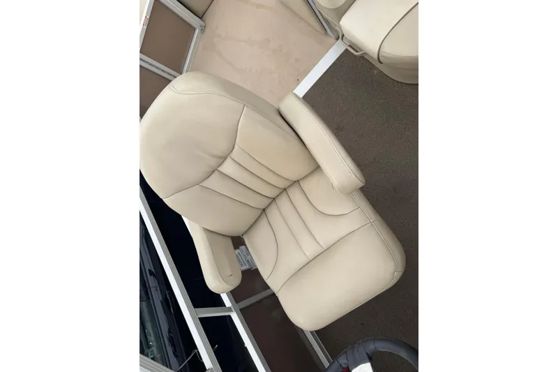 Slide: The Image of Beige captain's chair on 2012 Bennington 24 SF boat, showcasing comfort and style. - 22