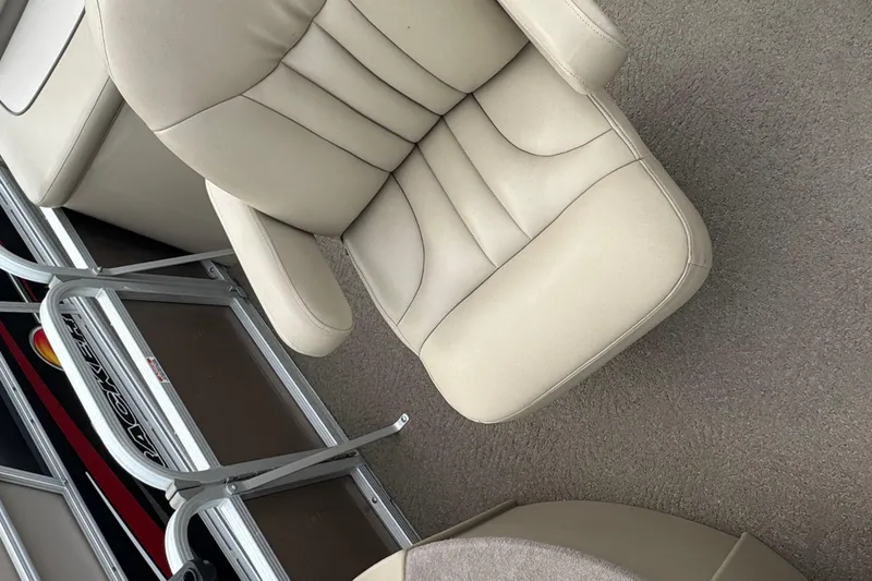 Slide: The Image of 2012 Bennington 24 SF boat with visible identification plate and metal railing. - 6