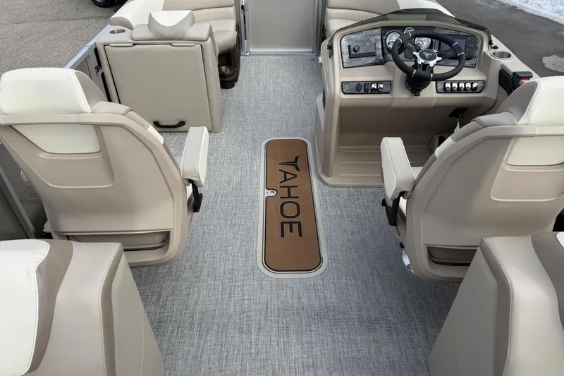 Slide: The Image of Interior of 2025 Tahoe 2185 boat with beige seating and modern dashboard. - 10